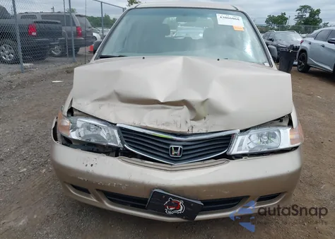 2000 Honda Odyssey Lx z USA, uszkodzony, nr VIN 2HKRL1859YH597748